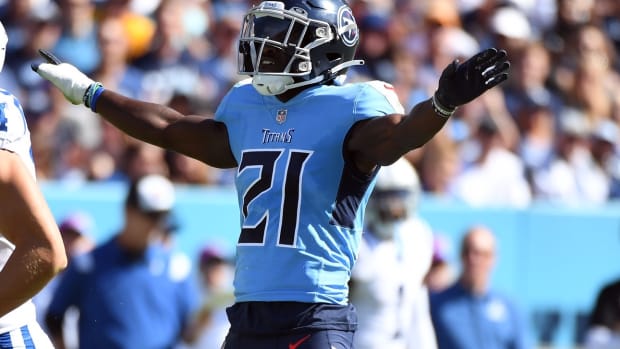 Tennessee Titans cornerback Roger McCreary (21) celebrates after a defensive stop on a pass during the first half at Nissan Stadium.